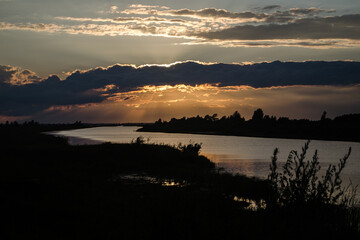 Beautiful golden sunset over lake Lubans and river Rezekne, Latvia