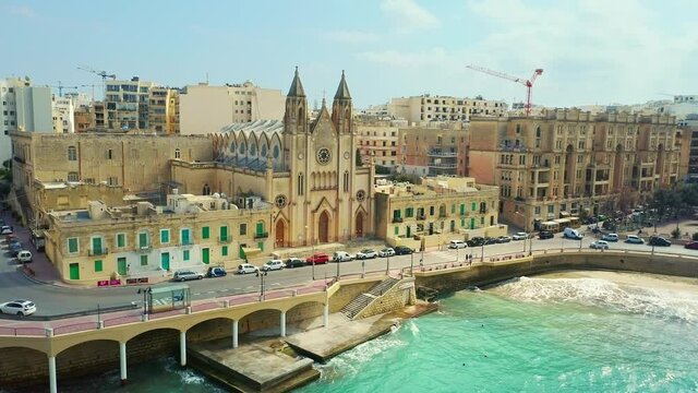 Aerial view of the church on Balluta Bay Beach in St. Julians city