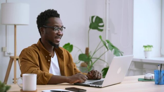 African business man at distant video meeting with colleague discuss plan and come to agreement Spbas. Entrepreneur talk about strategy at work. Tutor make lecture lesson for student