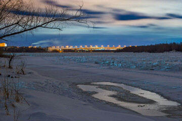 sunset over the river in winter in Omsk