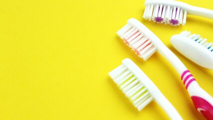 toothbrush on a yellow