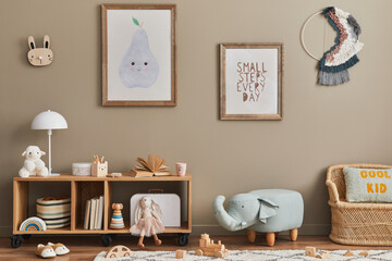 Stylish scandinavian kid room interior with toys, teddy bear, plush animal toys, mint armchair,...
