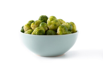 Set of brussel sprouts in a bowl isolated on white background