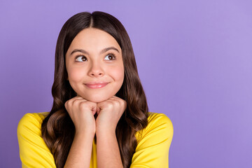 Fototapeta premium Portrait of nice optimistic brunette hairdo girl hand chin look empty space wear yellow t-shirt isolated on vivid lilac color background