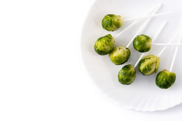 Set of brussel sprouts with lollipop sticks isolated on white background	