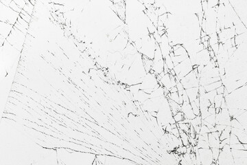 Broken white glass as background.