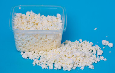 Milk curd on a blue background.