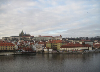 Naklejka na ściany i meble Scenic landscape with Prague Castle on a cloudy day