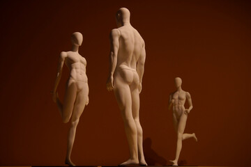 white sports mannequins on a plain background