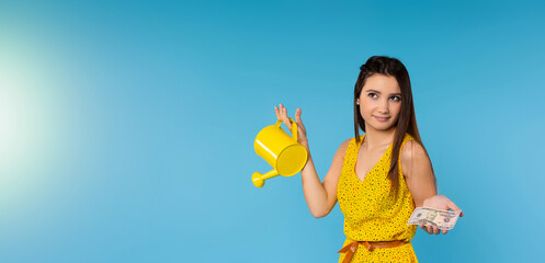 Portrait photo of a thinking Caucasian girl who doesn't know what to choose, isolated on a bright blue background