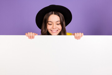 Photo of nice optimistic brunette hairdo girl look poster wear black cap isolated on lilac color background