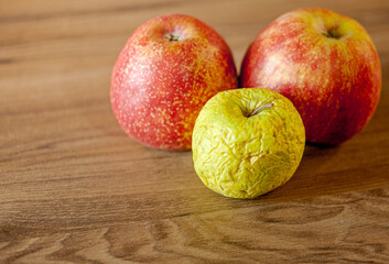 apples on a wooden table
