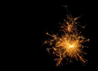 A picture of a real sparkler set against a black background