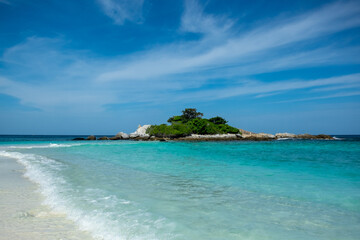 Clear blue water tropical beach with blue sky Racha Noi Island, Phuket,thailand. Beautiful tropical beach . Andaman sea in Thailand. Summer holiday vacation concept. 
