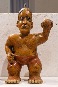 ancient mexican statuette depicting a ball player