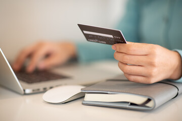 Close up of  businesswoman Handwriting on notebook paper in office, Modern freelance professions,Education and working at home  concept.