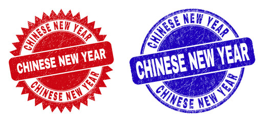 Rounded and rosette CHINESE NEW YEAR seal stamps. Flat vector grunge seal stamps with CHINESE NEW YEAR text inside round and sharp rosette shape, in red and blue colors.