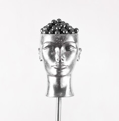 silver mannequin head isolated on white background