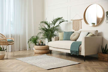 Stylish living room interior with beautiful house plants - obrazy, fototapety, plakaty