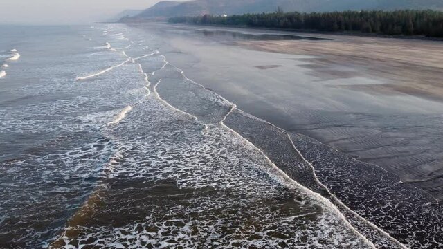 Aerial footage of Ladghar beach at Dapoli, located 200 kms from Pune on the West Coast of Maharashtra India.