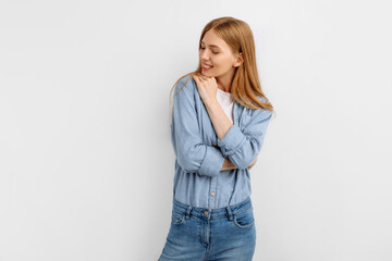 woman, in casual clothes, smiling while looking at camera, on white background