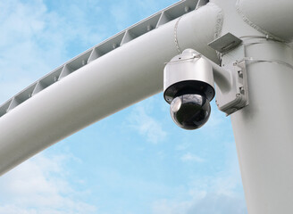 Modern public CCTV cameras with bright sky background. Intelligent recording cameras for...
