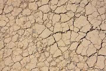 Dried out floor with earth and sand