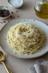 Roman pasta spaghetti with black pepper and cheese. Cacio e pepe. Recipes. Wine.