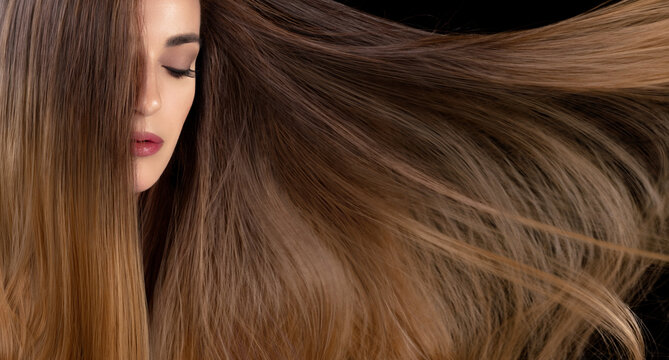 Healthy long hair. Beautiful model girl with shiny straight long hair. Hair care and spa treatments