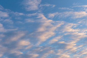White clouds on a blue sky. Sky and clouds  as patterns background.