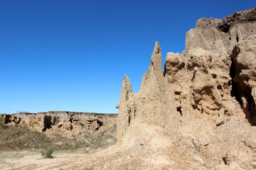Sandy hills in the Toropí Paleontological Site, Corrientes, Argentina. Gully erosion is a widespread and often dramatic form of soil erosion caused by flowing surface water. Fossil Site