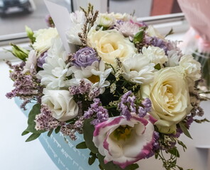 Bouquet of white flowers roses and other flowers closeup
