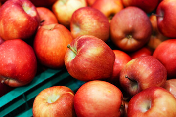 Fototapeta na wymiar Red apples. Selling ripe fruit in a shop. Close-up