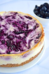 Blueberry cheesecake on white background. selective focus