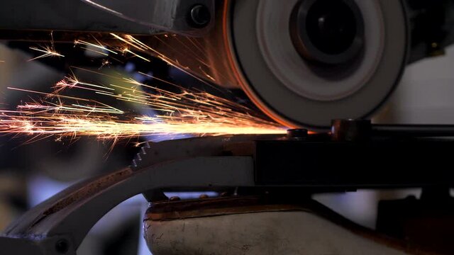 Close Up of Figure Skate Blade Sharpened in Machine