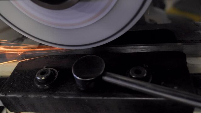 POV of Hockey Skate Blade Sharpened in Machine