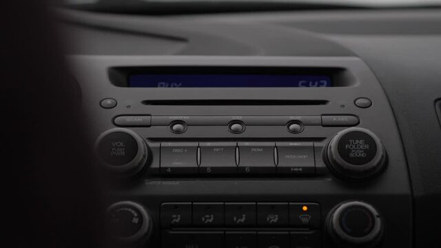 Close Up of Stereo in Small Car on a Road Trip