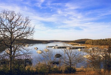 Shot looking out over Bull Shoals Lake and Boat Dock on beautiful winter evening in Bull Shoals, Arkansas 