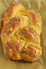 Fresh Slices of Homemade Baked Breaded Bread with Poppy Seeds and Cashew nuts