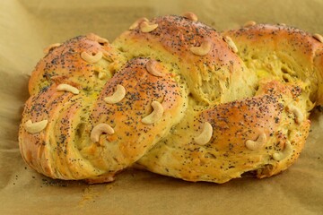 Fresh Slices of Homemade Baked Breaded Bread with Poppy Seeds and Cashew nuts