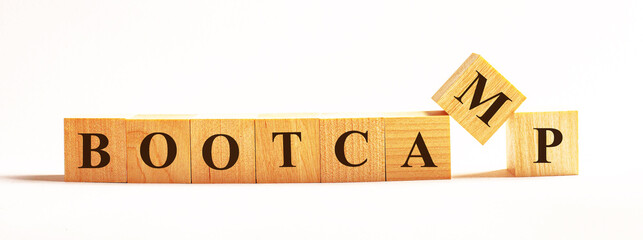 On a light background, wooden cubes with the text BOOTCAMP