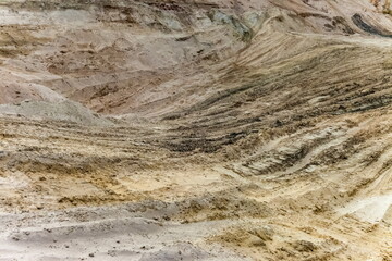 Sandy lake shore in autumn close-up. Background
