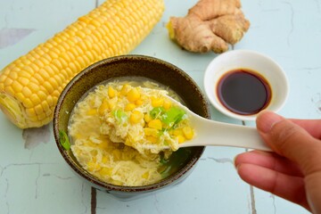 Corn egg drop soup with spring onions