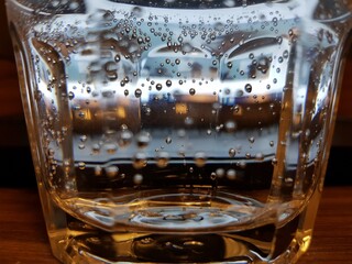 Air bubbles in a glass of water