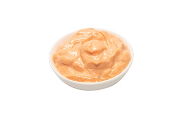 Sauce in a bowl isolated on white.
