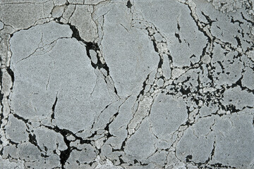 Fototapeta premium Risse in weisser Farbflaeche