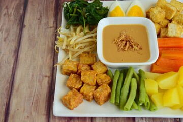 Traditional Indonesian Food, Gado-gado. Made from boiled vegetable, egg, tempeh and fried tofu served with peanut sauce