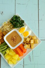 Traditional Indonesian Food, Gado-gado. Made from boiled vegetable, bean sprouts, egg, tempeh and fried tofu served with peanut sauce