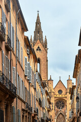 bunk houses and belfry on a narrow street in the city of Aix-en-Provence