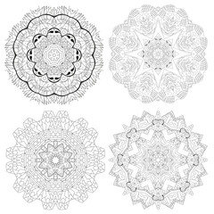 Hand drawn zentangle set of 4 mandalas for coloring page.